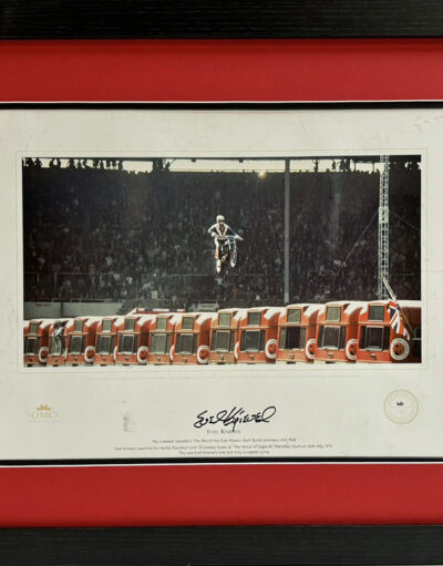 Evel Knievel Personally Signed Bus Jump Picture in Framed Presentation